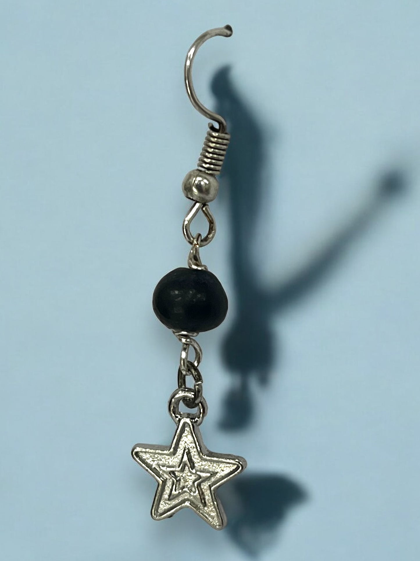 Aretes Colgantes con Estrella Plateada