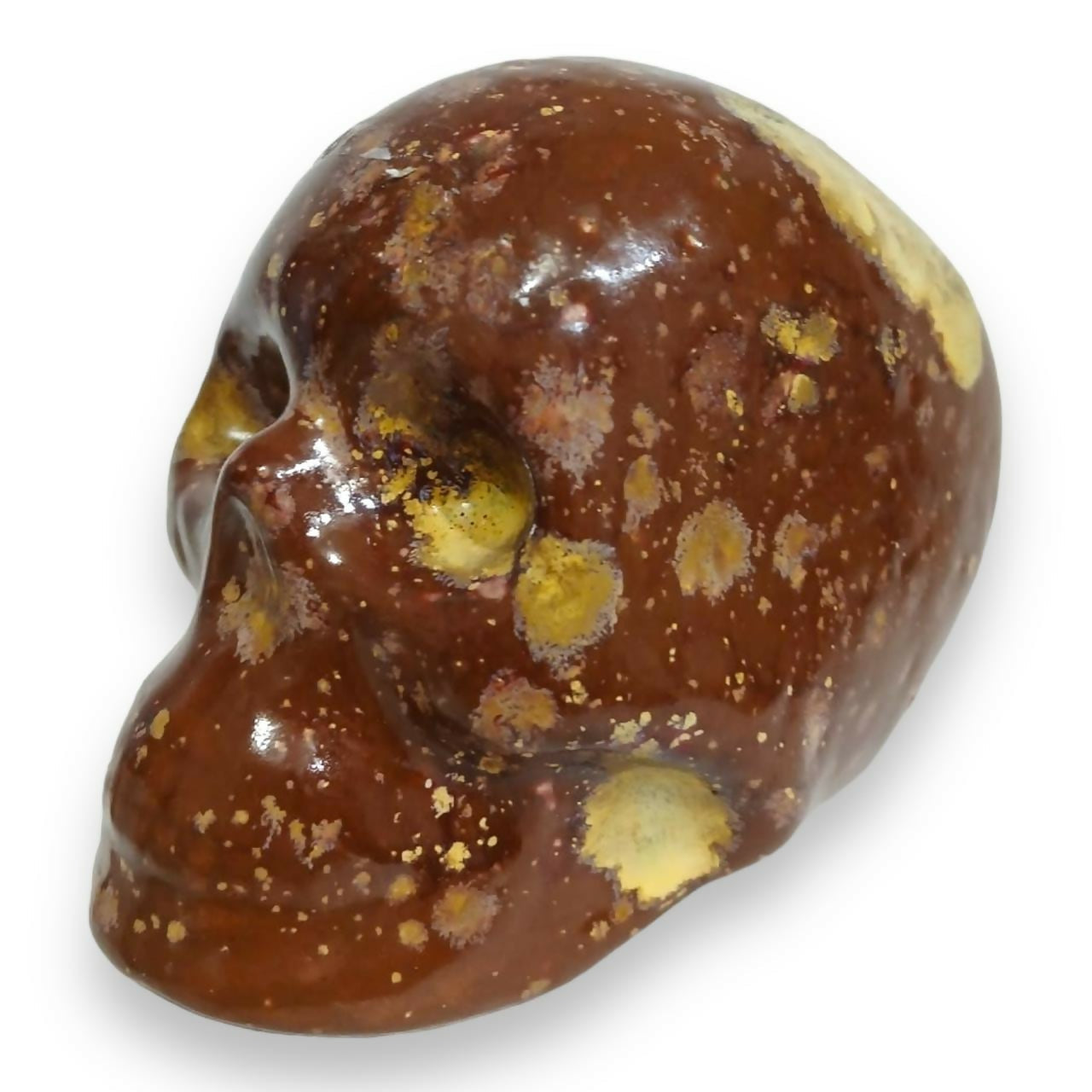 Cráneo de ceramica pintado a mano en horno cerámico